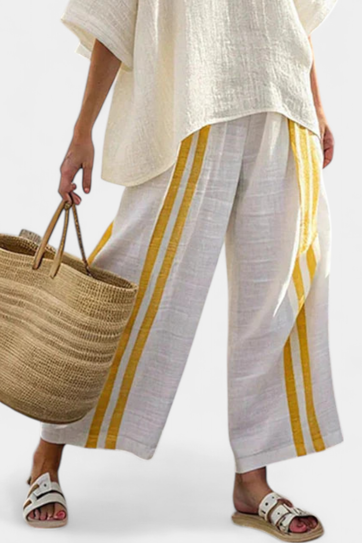 Arianna | Women's elegant yellow striped top and wide-leg trousers